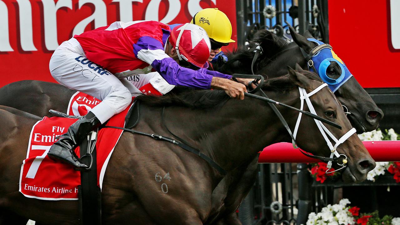 Emirates Stakes Day at Flemington Race course, Race 9 Emirates Handicap 1400m, (L) Dom Tourneur onboard Eclair Big Bang runs down Craig Williams onboard Boristar. Melbourne. 8th November 2014. Picture : Colleen Petch.
