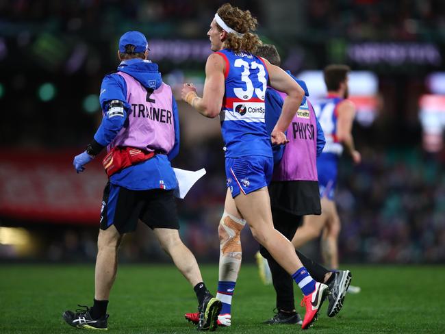 Aaron Naughton hurt his knee in a marking contest and was hampered for the rest of the game. Picture: AFL Photos/Getty Images