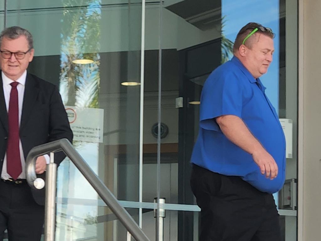 Craig Paul Carrington (right) at Rockhampton Courthouse with David Mills, part of his legal team.