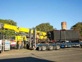 BIG LIFT: The tender being lowered onto the back on an awaiting truck. Picture: Jacob Carson