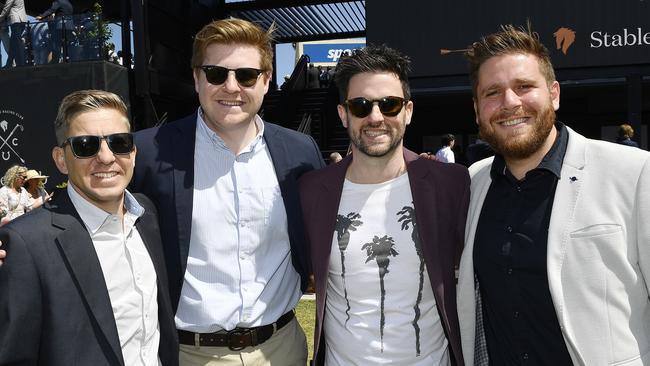 Caulfield Guineas horse race meeting, Caulfield, Victoria, Saturday 12th October 2024. Faces in the crowd. Pictured enjoying the race meeting are Geoff, Tyre, James and Haysam. Picture: Andrew Batsch