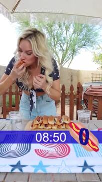 Paige Spiranac preparing for Nathan's Hot Dog eating contest