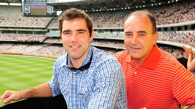 Cameron Smith and his dad Wayne at the Boxing Day test in 2008.