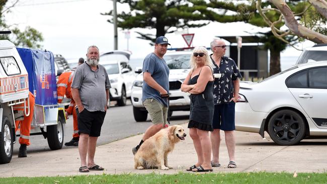 Locals near the scene of the fire. Picture: Nicki Connolly