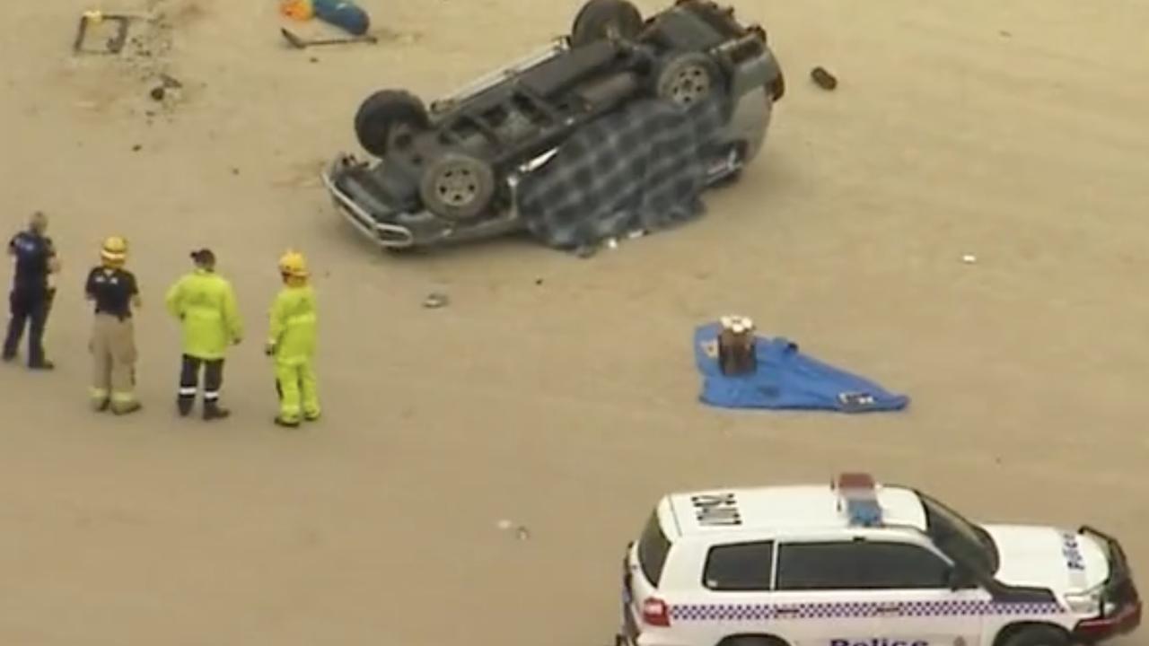 Emergency services at the scene of the fatal beach crash at Teeewah. Photo: Nine News