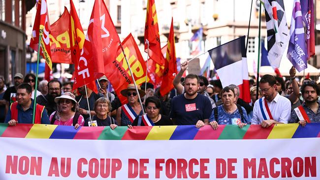 Demonstrators in Strasbourg hold a banner during a demonstration against the appointment of the new right-wing Prime Minister Michel Barnier. Picture: AFP