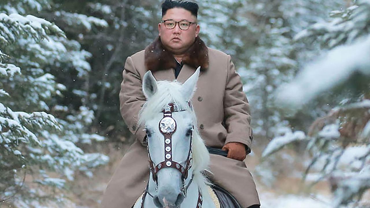 This undated file picture released by the Korean Central News Agency in October 2019 shows North Korean leader Kim Jong-un riding a white horse among the first snow at Mount Paektu. Picture: STR/ KCNA via KNS/AFP