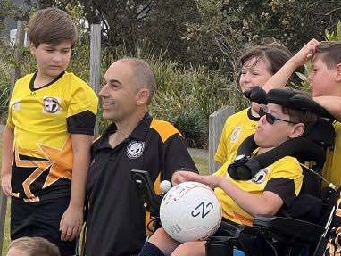 Manager Trevor Picken and his members of the all abilities program at the Sunshine Coast Churches Soccer Association. Photo: contributed.