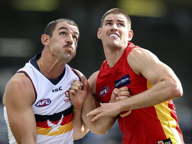 AFL - Adelaide Crows v Gold Coast at Noarlunga Oval.T Taylor Walker contests the boundary throw in with Zac Smith SARAH REED