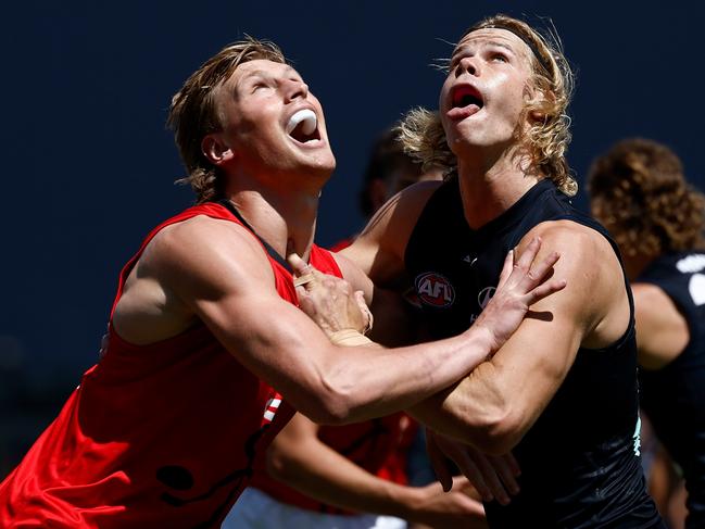 Max Heath and Tom De Koning wrestle in the ruck. Picture: Michael Willson/AFL Photos via Getty Images.