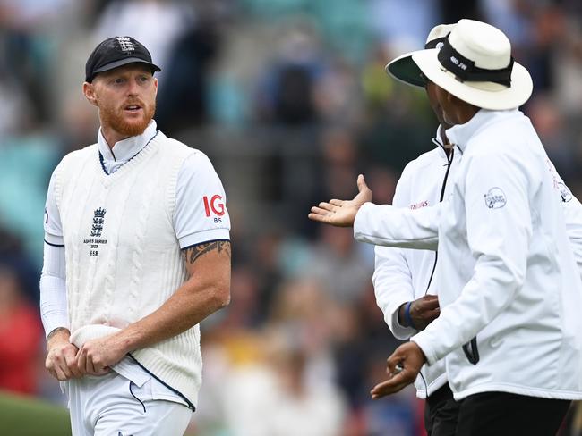 LONDON, ENGLAND - JULY 31: Ben Stokes of England reacts alongside Match Umpires Joel Wilson and Kumar Dharmasena following a review for the wicket of Steve Smith of Australia which is given not out during Day Five of the LV= Insurance Ashes 5th Test Match between England and Australia at The Kia Oval on July 31, 2023 in London, England. (Photo by Gareth Copley/Getty Images)