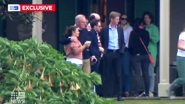 Scott Morrison (pictured with wife Jenny during a final party at The Lodge) has ordered the removalists to pack up his belongings from the Canberra residence. Picture:9News via Twitter