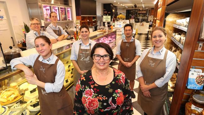 New Farm Deli owner Maria Anello with her staff. Picture: Peter Wallis