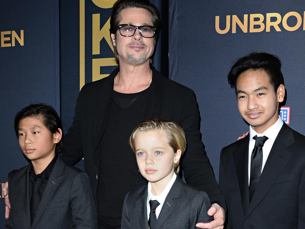 A 2014 photo of Pitt with children Pax Jolie-Pitt (L), Shiloh Jolie-Pitt (C) and Maddox Jolie-Pitt. Picture: AFP/ROBYN BECK