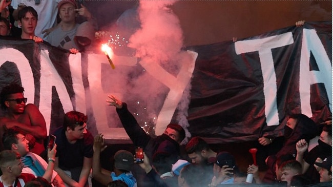 Flares thrown from spectators onto the pitch at AAMI Park chaos before the chaos. Picture: Victoria Police