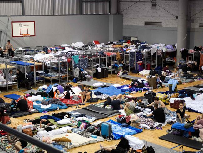 Ukrainian refugees fleeing war, camp inside a shelter in a gymnasium in Tijuana, Baja California, Mexico, before they are bussed to border crossings from Mexico to the United States. Picture: AFP