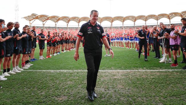 Outgoing Essendon coach John Worsfold leaves the field after Saturday’s loss to the Demons. Picture: Michael Willson/AFL Photos