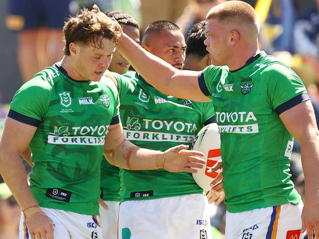 Ethan Strange of the Raiders (L) celebrate a try with teammates during the NRL Pre-season challenge match between Canberra Raiders and North Queensland Cowboys. Picture: Getty Images