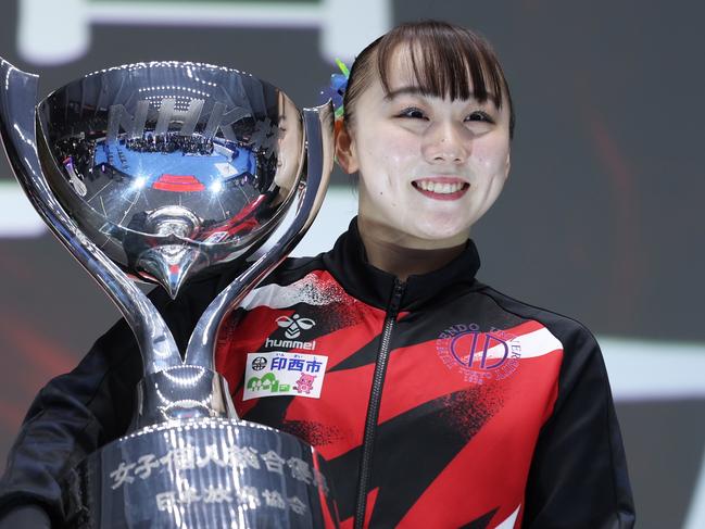 TAKASAKI, JAPAN - MAY 18: Winner Shoko Miyata poses with the trophy after the Women's competitions on day three of the Artistic Gymnastics NHK Trophy at Takasaki Arena on May 18, 2024 in Takasaki, Gunma, Japan. (Photo by Kiyoshi Ota/Getty Images)