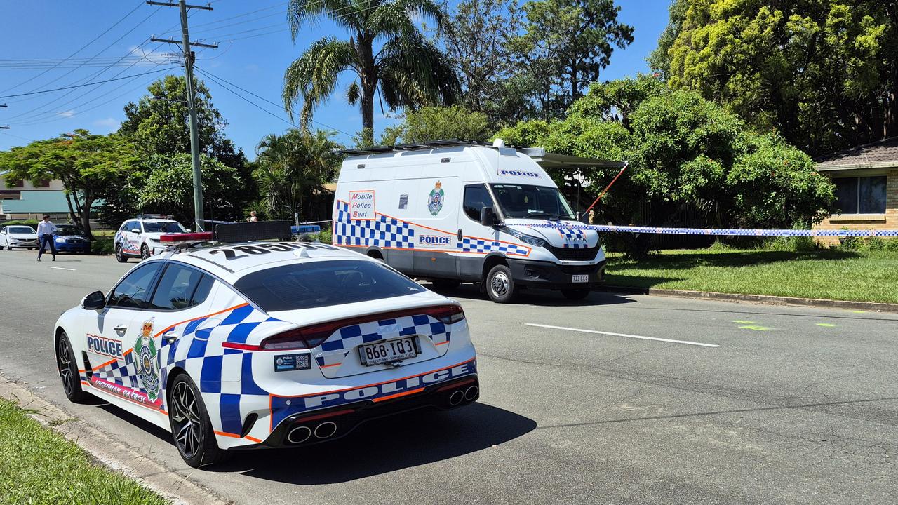 Police vehicles on Railway Parade, Caboolture, on Sunday. Picture: Richard Walker