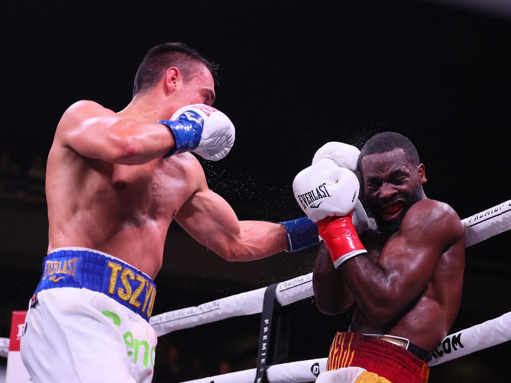 MINNEAPOLIS, MN - MARCH 26: Tim Tszyu (white with blue trunks) v Terrell Gausha (white with red and gold trunks) box in the Super Welterweight main event at the Armory on March 26, 2022 in Minneapolis, United States. Tszyu, in his USA debut defeated Gausha by judges decision. Adam Bettcher/Getty Images/AFP == FOR NEWSPAPERS, INTERNET, TELCOS &amp; TELEVISION USE ONLY ==