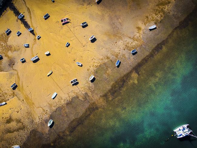 DRONE - Victoria Point, Queensland. Boats at low tide. Picture: NIGEL HALLETT