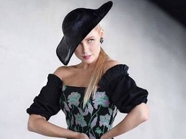 A Coopers model shows off the latest race day fashion trends.