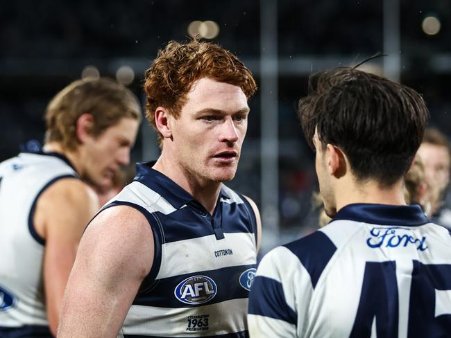 Gary Rohan chats with Brad Close. Picture: Dylan Burns/AFL Photos via Getty Images