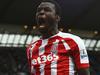 MANCHESTER, ENGLAND - AUGUST 30: Mame Biram Diouf of Stoke City celebrates scoring the opening goal during the Barclays Premier League match between Manchester City and Stoke City at Etihad Stadium on August 30, 2014 in Manchester, England. (Photo by Shaun Botterill/Getty Images)