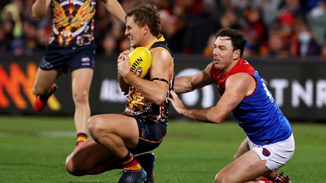 Dawson marks in front of Michael Hibberd at the Adelaide Oval. Picture: James Elsby/AFL Photos via Getty Images