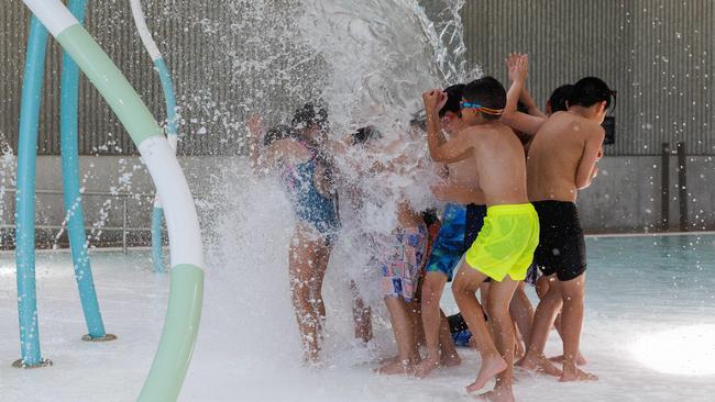 Children enjoy the splash play area. Picture: David Swift