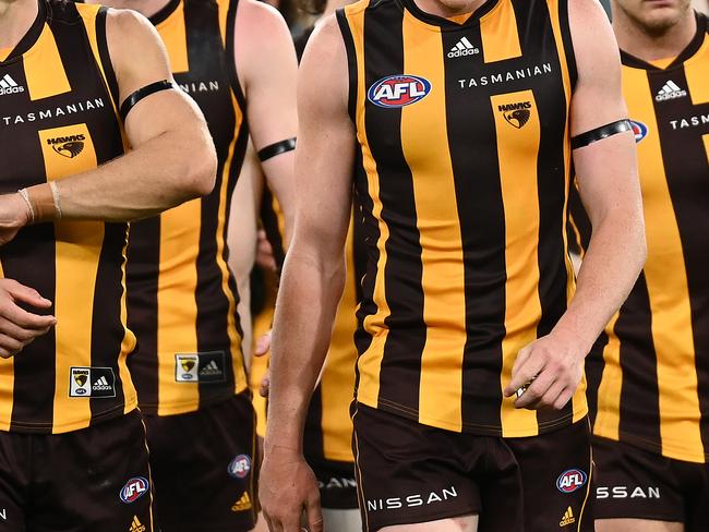 MELBOURNE, AUSTRALIA - APRIL 10: The Hawks look dejected after losing the round four AFL match between the Hawthorn Hawks and the St Kilda Saints at Melbourne Cricket Ground on April 10, 2022 in Melbourne, Australia. (Photo by Quinn Rooney/Getty Images)