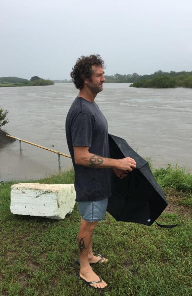 Adam Quinn Hermit Park checks Ross River. Picture: Evan Morgan