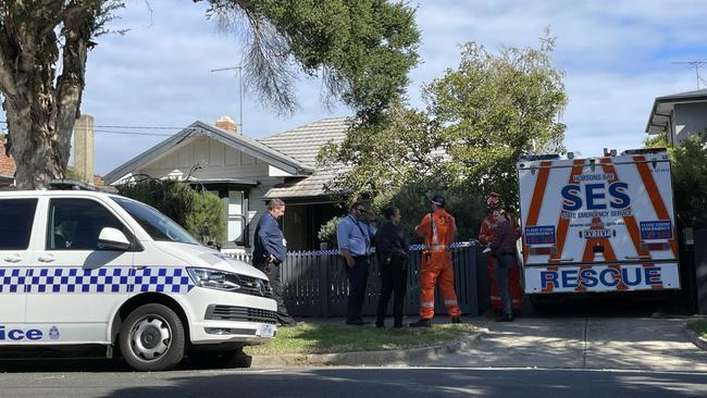 The SES and police at the scene of the arrest. Picture: Brianna Travers