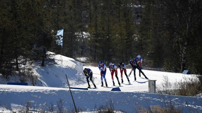 Athletes compete in the men's normal hill individual gundersen 10km during the FIS Continental Cup Nordic Combined 2021/2022, part of a 2022 Beijing Winter Olympic Games test event in Chongli county, Zhangjiakou. Picture: AFP