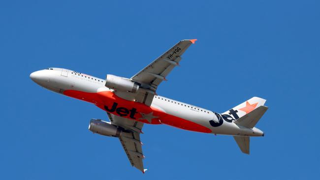 Planes arriving and leaving Brisbane Airport. Jetstar flight departs. Eagle Farm 29th August 2021 Picture David Clark