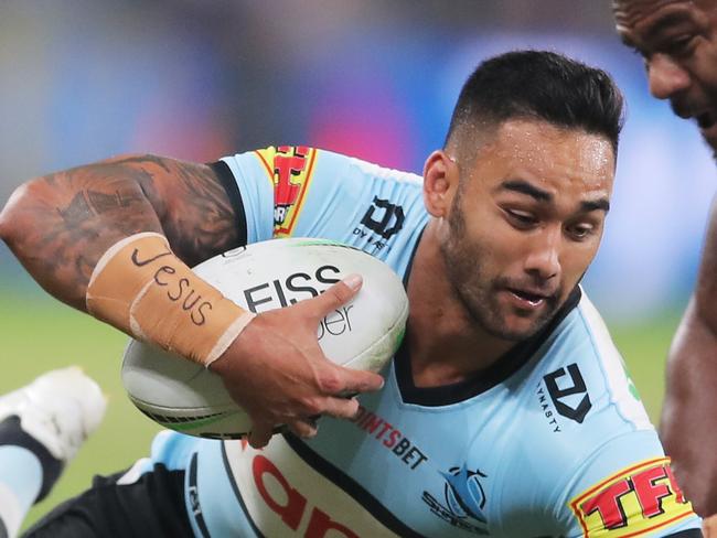 SYDNEY, AUSTRALIA - MARCH 27:  Briton Nikora of the Sharks is tackled by Maika Sivo of the Eels during the round three NRL match between the Parramatta Eels and the Cronulla Sharks at Bankwest Stadium on March 27, 2021, in Sydney, Australia. (Photo by Matt King/Getty Images)