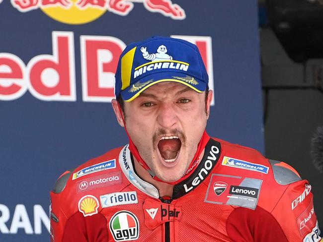 Ducati Lenovo Team's Australian rider Jack Miller celebrates on the podium after winning the MotoGP race of the Spanish Grand Prix at the Jerez Circuit in Jerez de la Frontera on May 2, 2021. (Photo by PIERRE-PHILIPPE MARCOU / AFP)