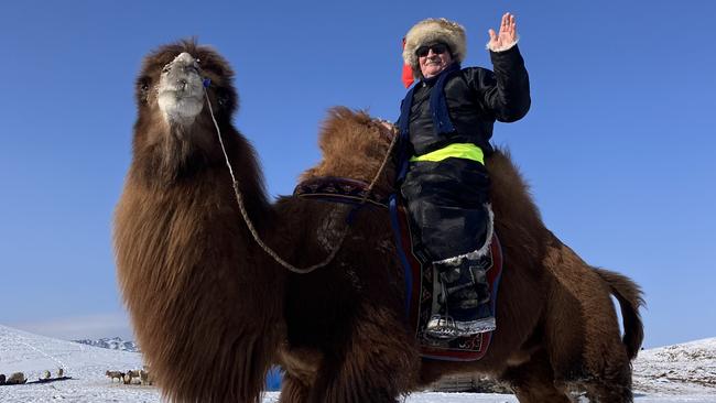 Paddy McHugh in Mongolia with a two hump camel. Picture: Supplied