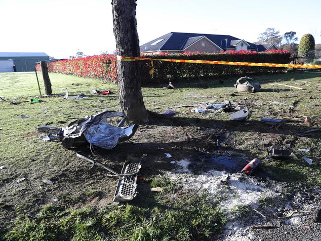 Debris strewn across the grass from the crash. Picture: John Grainger