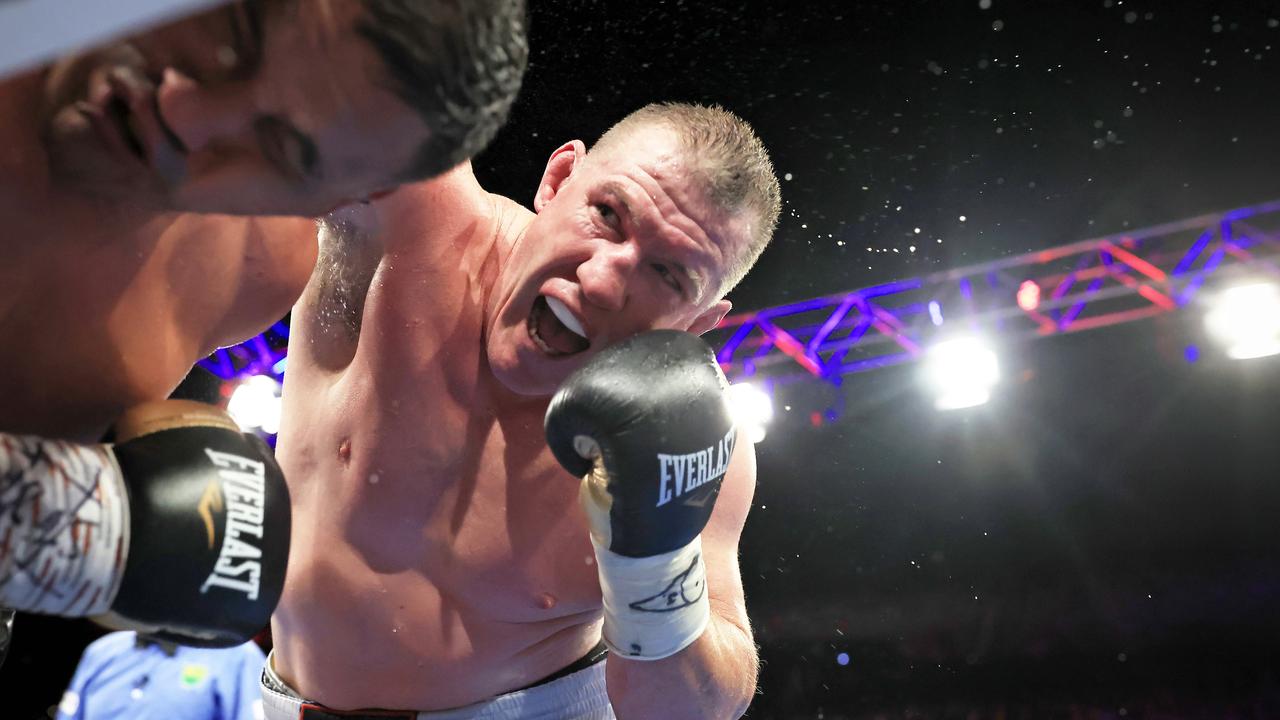 Paul Gallen lands a blow on Hodges up against the ropes. Picture: Mark Evans/Getty Images