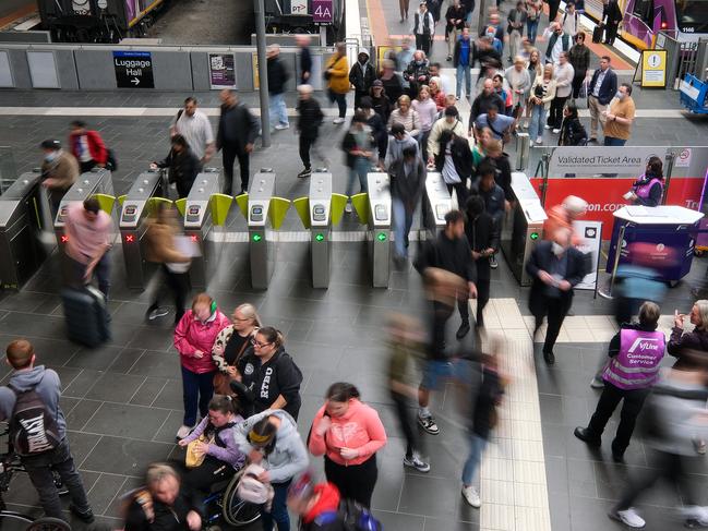 MELBOURNE, AUSTRALIA - NewsWire Photos DECEMBER 13, 2022: Photo commuters at Southern Cross train station.Picture: NCA NewsWire / Luis Enrique Ascui