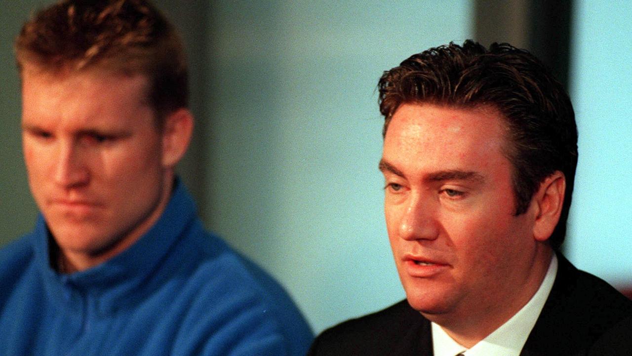 Eddie McGuire and Nathan Buckley front the media in 2000.