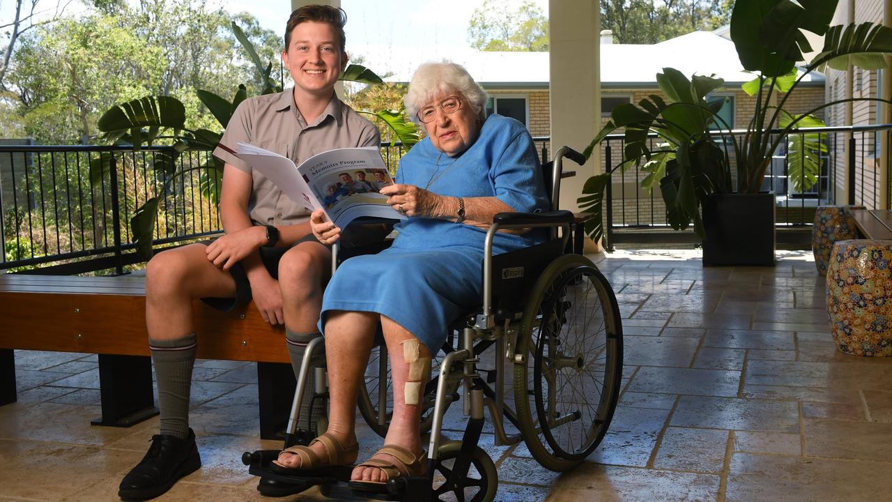 Ipswich Grammar School student Mackinlay Sturges volunteers to spend time with Bundaleer Lodge Nursing Home resident Lillian Weber in 2020. Picture: Rob Williams