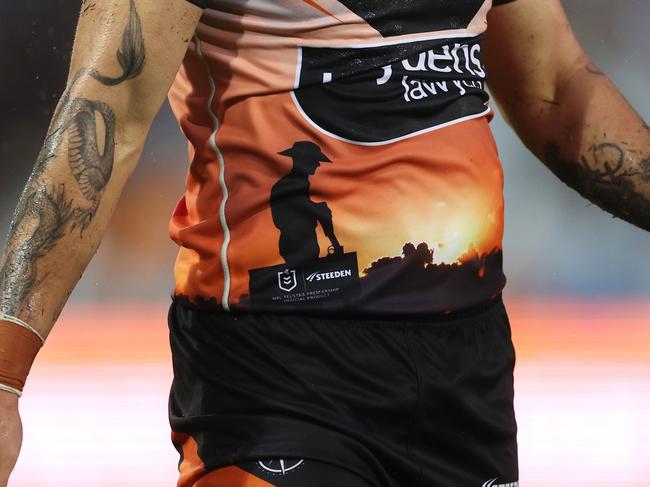 SYDNEY, AUSTRALIA - APRIL 23: The Anzac jersey worn by Charlie Staines of the Wests Tigers is seen during the round eight NRL match between Wests Tigers and Manly Sea Eagles at Campbelltown Stadium on April 23, 2023 in Sydney, Australia. (Photo by Mark Kolbe/Getty Images)