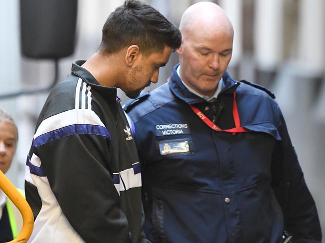 Codey Herrmann (left) arrives at the Supreme Court in Melbourne, Tuesday, October 1, 2019. Picture: Julian Smith/AAP