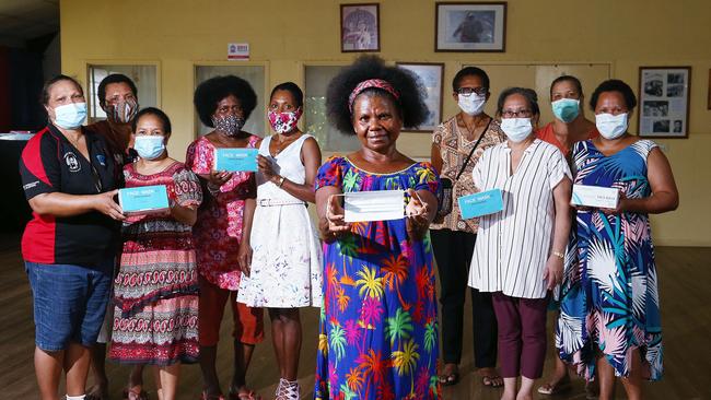 Cairns-based Papua New Guinea women seek donations to buy single use face masks and latex gloves for overwhelmed hospitals in the country's provinces. Picture: Brendan Radke