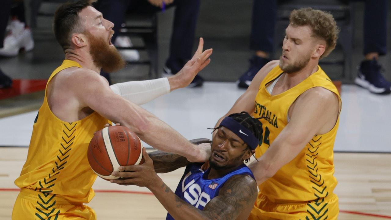 USA star Bradley Beal (centre) has been placed under Covid-19 health and safety protocols — just two days after playing against the Australian Boomers.