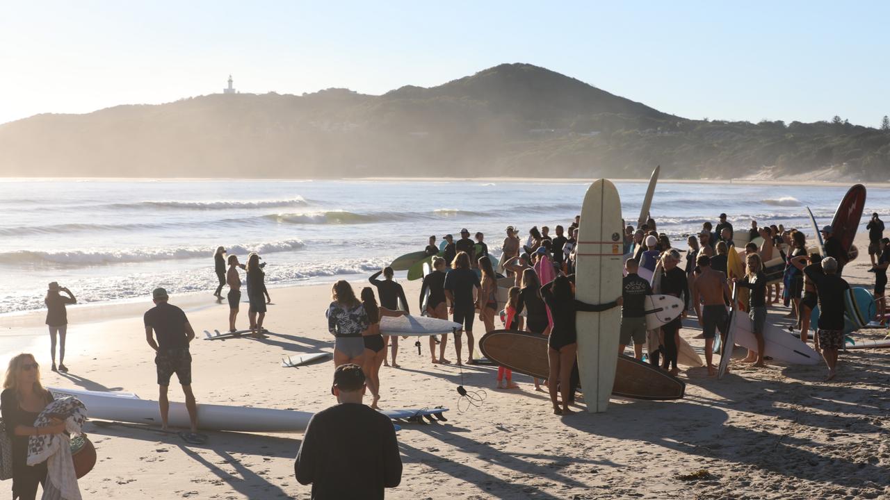 Members of the public took part in a paddle-out at Byron Bay's Main Beach to protest against the planned Netflix reality show Byron Baes on the morning of Tuesday, April 20, 2021. Picture: Liana Boss