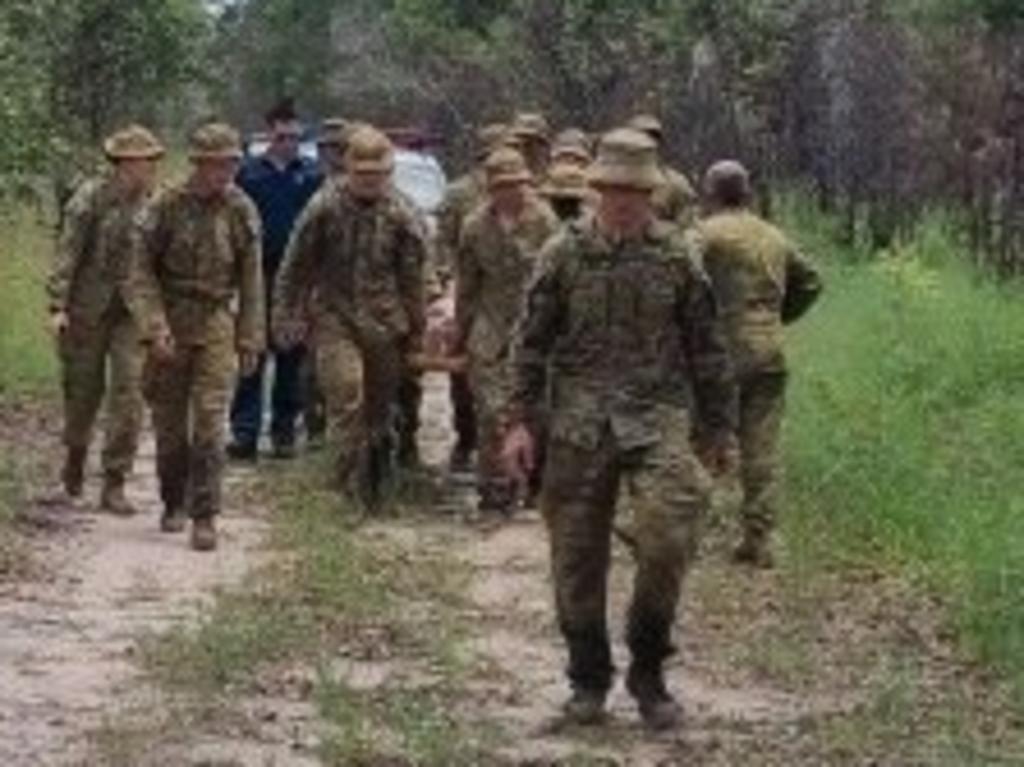 Paul Kearns was carried by stretcher back to the roadside by ADF soldiers after being found in an isolated and hard to access location in the bush.